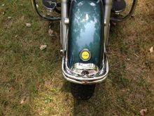 I had a chip on the front fender tried brush touching it up , looke ok from a few feet the i decided to mount this challenge coin over it much better