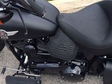 Heat shield with alligator embossed leather.