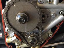 Notice the tensioner pushed all the way in. Left side of chain was real real tight still and right side was sloppy loose.