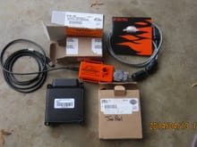 Harley-Davidson EFI ECM 32534-11 and Screamin' Eagle Super Tuner 32109-08C with Software and Cables.