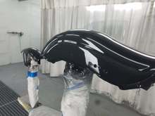 The front and rear fenders are painted gloss black.