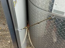 Keeps the door from beating you up.
