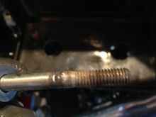 Battery tray jacking bolt