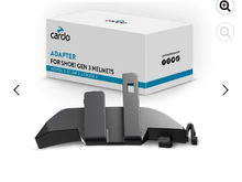 They do make an adapter to mount the Cardo to your helmet.  It’s a little cleaner looking.  
You shouldn’t lose any functionality by going with SENA.
