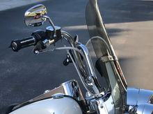 14" police bars with 4" risers...depending on the angle they can be from 14" to 18"....