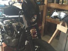 Added a bikini fairing (never order from ultra supplier on ebay). The parts are of good quality, but came with zero instruction on how to mount it and the mounting bracket is so thin the whole fairing/headlight will bounce when the bike is running.  Time to go to the drawing board to increase the rigidity of the bracket.