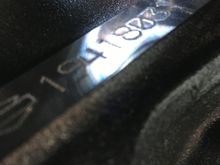 Engine code stamped on lower right side of engine