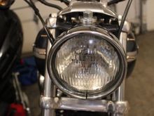 Here is a shot with the T-bolt clamps in place and the headlight in it's new position.