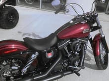 2013 FXDB street bob. Big red hard flake. hard candy custom color of the year. also this bike is/ was a raffle prize from Harley and Miller High Life