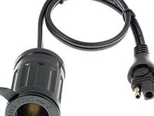 I use one of these off the battery tender pigtail & then a normal car cigarette lighter charger to the phone. This setup also gives me somewhere to plug my portable compeessor to blow up my camping air mattress.