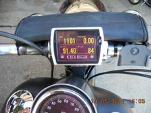 Power Vision installed on handlebars, set to display MPH, RPM, inlet temp, eng temp