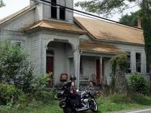 Old abandoned church on a back road in VA with people living in it