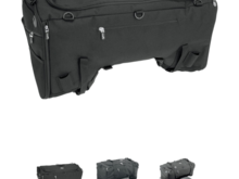 I used this a lot , not waterproof but packed everything in kitchen bags before loading. The are others that have e a rain cover.