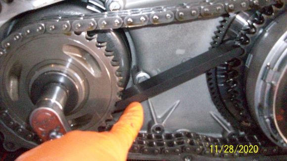 Hartland Products primary drive locking bar 5.950" long. In position for loosening drive sprocket bolt. Reverse position to tighten bolt.