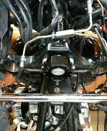 Earlier this year, I mounted a steering stabilizer on the underside of my lower triple tree. It maybe helped just a little, but not nearly the improvement I was looking for. So I removed it and looked elsewhere. The swingarm stabilizer is what made the most difference. Looks like they should all work the same, so pick whatever brand you like.