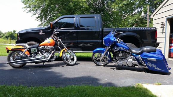 2000 Wide Glide 107 C.I. 272 cams, ported and polished heads, 127 HP.  2003 Electra Glide, stock engine, but a little custom.  2007 Ford 350 Harley edition.