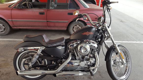 This is my sportster. All stock except the seat and now the passenger mounting kit . Next will be some joker footpegs and a burley sissy bar w a backrest