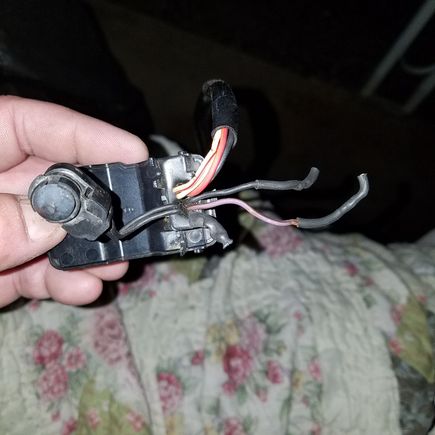 The two wires poking out to the right that still have the heat shrink on them are the two that i snipped to remove the mirror. They will be the two that i need to lengthen and feed back through the bars to provide power to my new turn signal. I will have to break out my meter tomorrow and start testing.