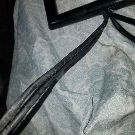 You can see here that the heat shrink got skinned up every step of the way diring the pull. You can also see the corner i was talking about that is razor sharp on the inside. 