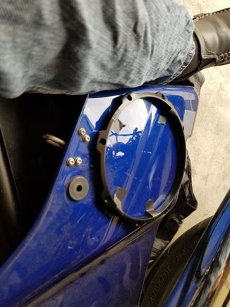 using the speaker bracket as a template for the holes and cutting