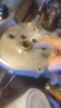 This is the bushing I'm referring to. Also realized if I put that washer on the outside face of the forward primary sprocket it would aid in later removal as I could drive bolts through the sprocket and push it off without marring the aluminum surface of the case? It would also possibly provide the right clearance gap for the opposite side main bearing. Might try it and let yall know how it goes.