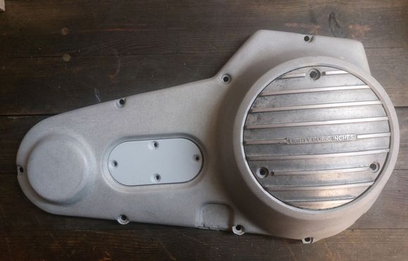 My primarry blank polished aluminum with derby cover & a dechromed inspection cover . . . .