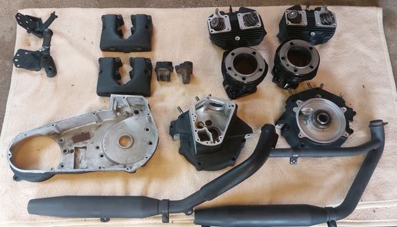 OEM exhaust & Black wrinkle finish  parts, will be taking the casses to a shop to put the flywheels in & seal the cassses, then i will assemble the rest of the engine