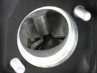WHAT YOU SEE THERE, WAS A CHUNK OF WELDED ALUMINUM AT ONE TIME, NOW YOU SEE IT GOES INSIDE, ITS NOT TOTALLY OPEN. AGAIN, IVE LEARNED ALOT ON ENGINES...MORE IS NOT ALWAYS BEST...