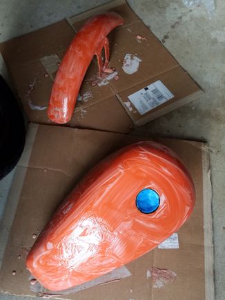 Tins with acid peel to remove paint