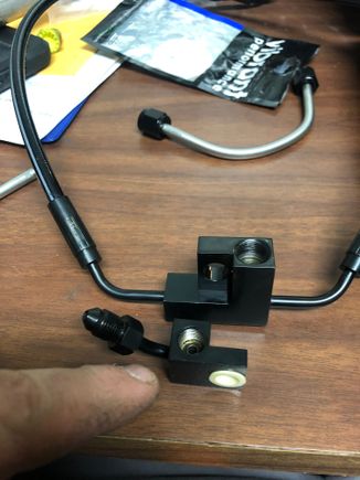 Distribution port for ABS module (not needed, except for the mounting hole (in white)