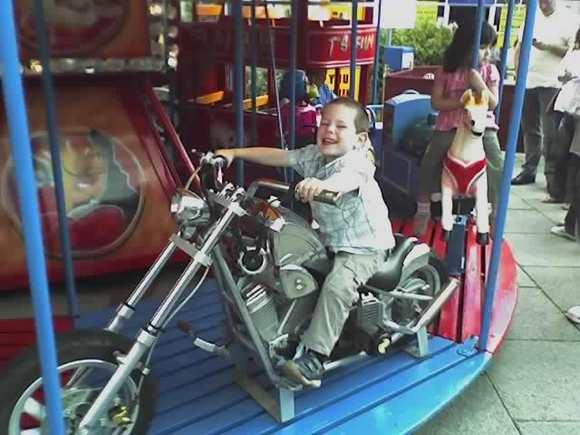 My son Aarron on his first chopper.