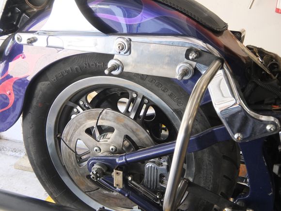 Homemade SS brackets to lower saddlebags about 2" as there was to much room between the top of the pipe and the bottom of the bag.