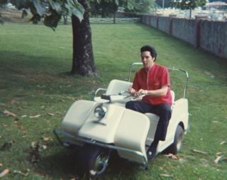 Elvis in a Harley-Davidson Golf cart