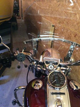 Lighter outlet is Harley part, phone mount is Ram sold by a company named Leader, or something like that.
