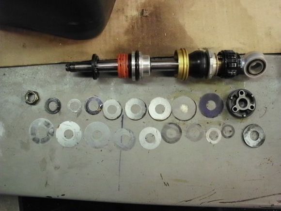 Piston before rebuild, notice the dirt & scorched oil.