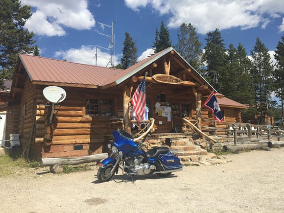 Top Of The World store. Worthy of a stop. A man, his son and one of his sons cousins, all from China, asked me if they could get a picture of me with them by the bike. We did that then I asked them if they wanted pictures of them on of Darla. The father and the girl got on the bike and had pictures taken. It was so much fun I forgot to take a picture of them doing it.