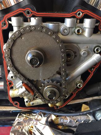 Notice the tensioner pushed all the way in. Left side of chain was real real tight still and right side was sloppy loose.