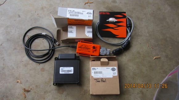 Harley-Davidson EFI ECM 32534-11 and Screamin' Eagle Super Tuner 32109-08C with Software and Cables.