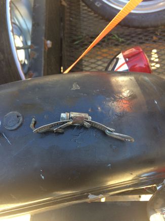 This was the homemade strap holding the tank..