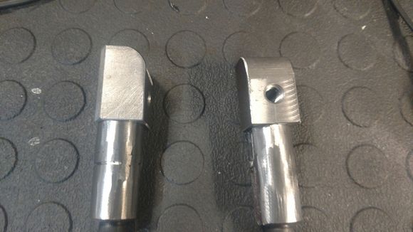 Blocks I made to slide into my frame and mate to the street glide frame. I'll weld them in place and bolt to the street glide frame.