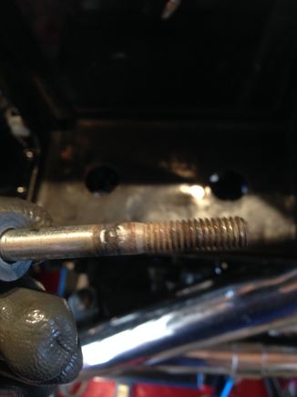 Battery tray jacking bolt