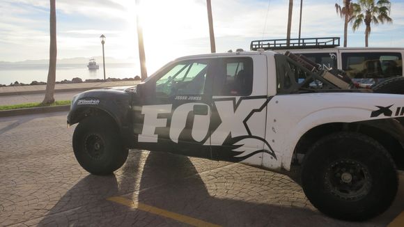 More Baja racers outside the hotel in the morning, a truck