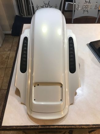 Came with pin stripes, wiring, lights and led lit tag frame.