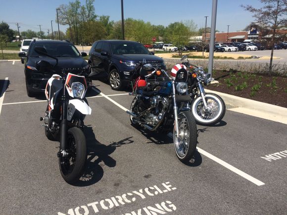 The freedom machines at work. Most of the time it's just my Harley and the triumph, but once in awhile another co-worker will ride his KTM 690. But due to its gearing and rider position he doesn't ride a lot of highway rides with us.