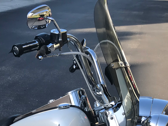 14" police bars with 4" risers...depending on the angle they can be from 14" to 18"....