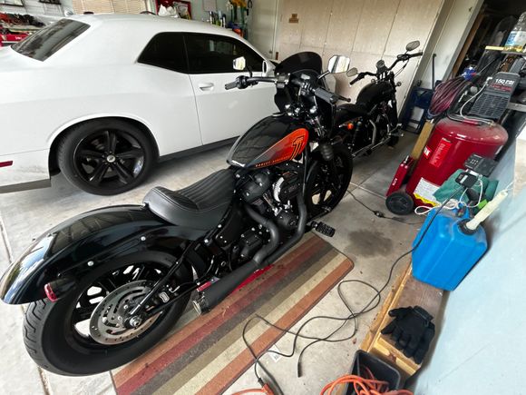 22 with Two Bros system, Thrashing Supply 9.5 risers, ODI Podium 1 tracker bars, HD Dominion pegs, Avon grips, Memphis Shades Road Warrior fairing and a cruise control (getting installed in the next week). Traded in my 13 FLD w/124” kit for this. Do not feel any regrets. 👍
​​​​​​​