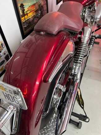  made the seat out of a piece of metal and had my friend  do the seat cover leather work ! Jimmy Z . made the rear fender with side marker lights turn signals  are from  Kirken