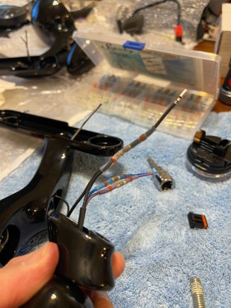 Spliced the wire with solder and heat shrink 