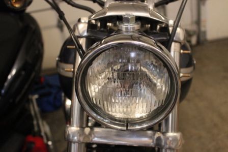 Here is a shot with the T-bolt clamps in place and the headlight in it's new position.