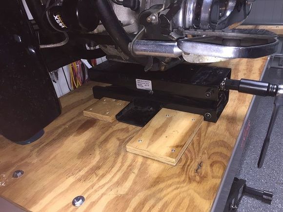 Scissor jack against chocks, can`t slide forward.